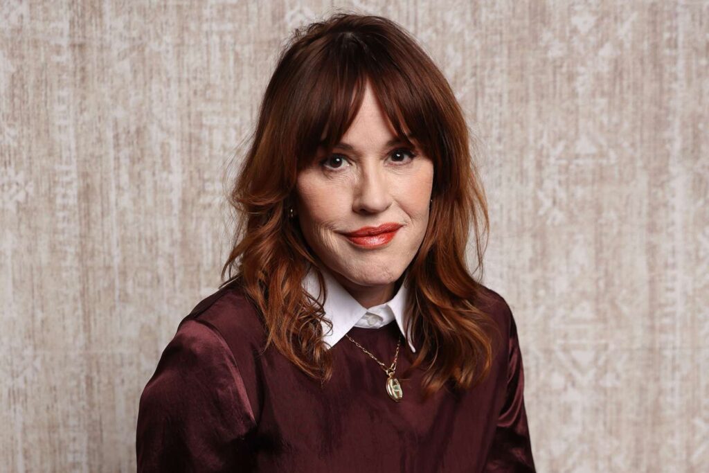 Molly Ringwald Bundled Up in a Blanket-Like Faux Fur Coat