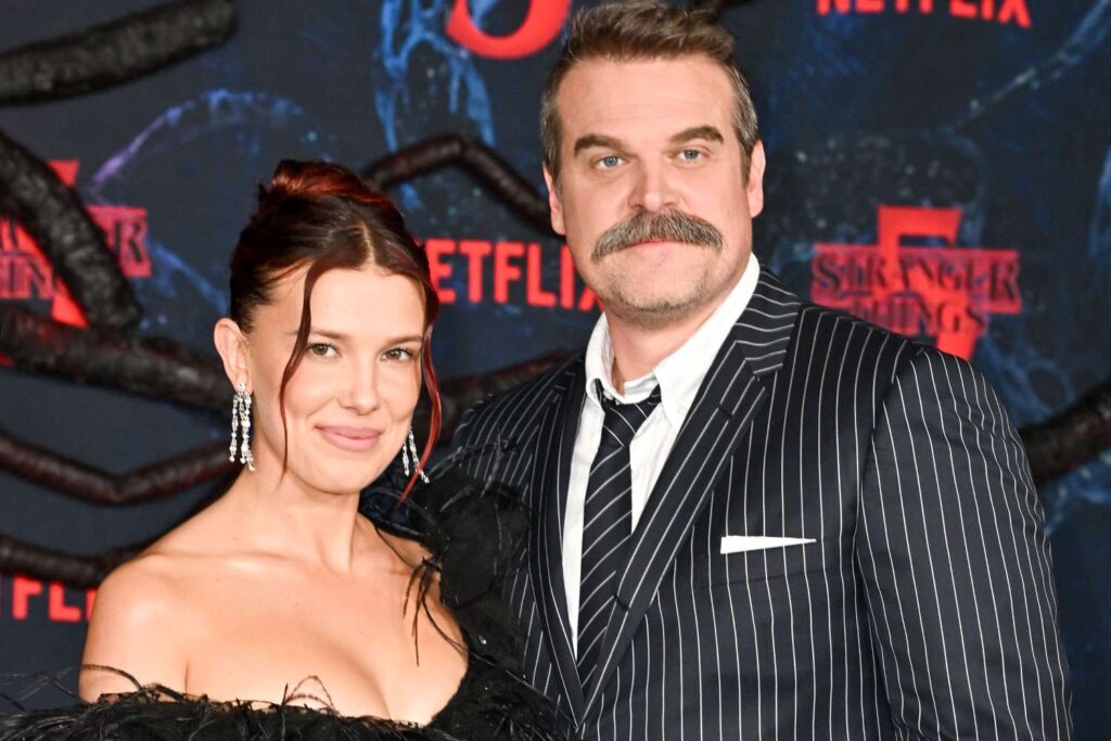 David Harbour, Millie Bobby Brown Hug at ‘Stranger Things’ Premiere