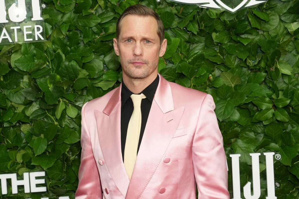 Alexander Skarsgård Brightens up the Gotham Awards Red Carpet with Pink Look