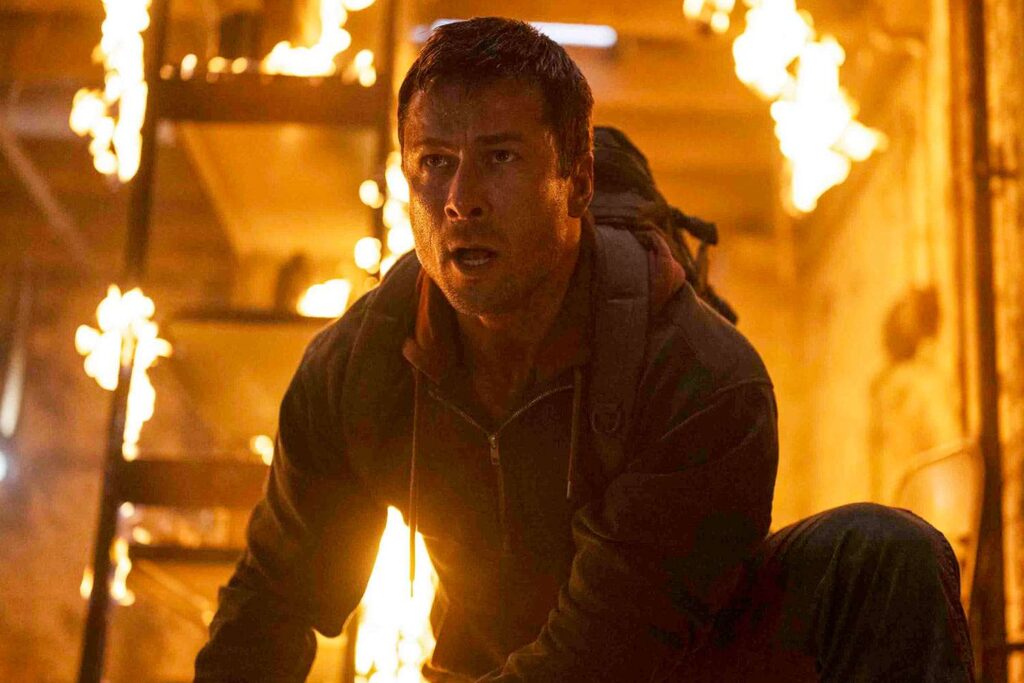 Go Behind the Scenes of Glen Powell’s Die Hard-Style Stunts in ‘Running Man’ (Exclusive)