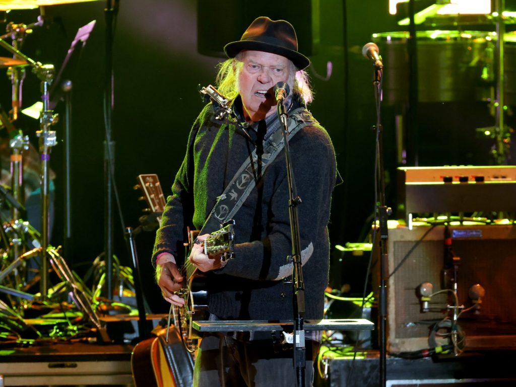 Neil Young Slams Apple, Verizon for ‘Backing the Fascist Trump Regime’